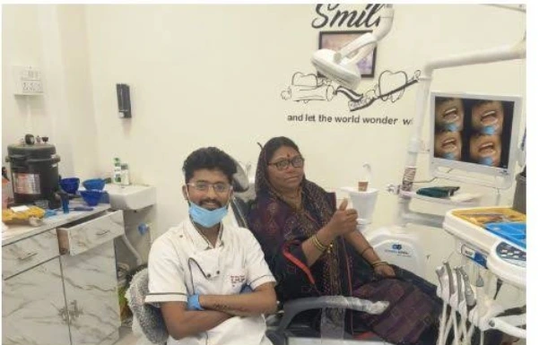 Close up of a patient smiling brightly after successful aesthetic dentistry